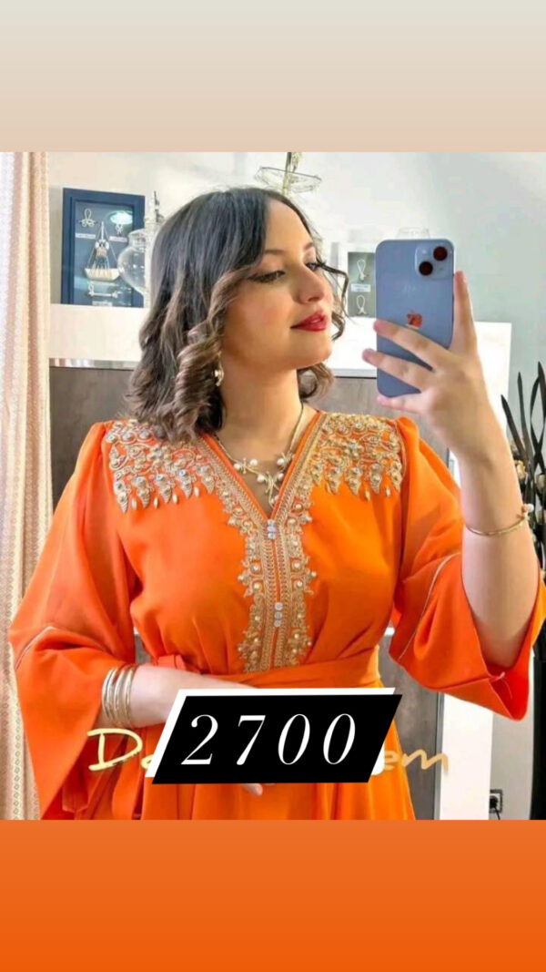 12E6D765-5C3A-4414-8852-945BD47724E5.jpeg ملابس النساء